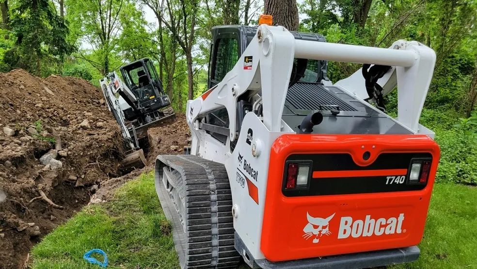 Bobcat T740 compact track loader on a site-work and excavation job in Rochester NY