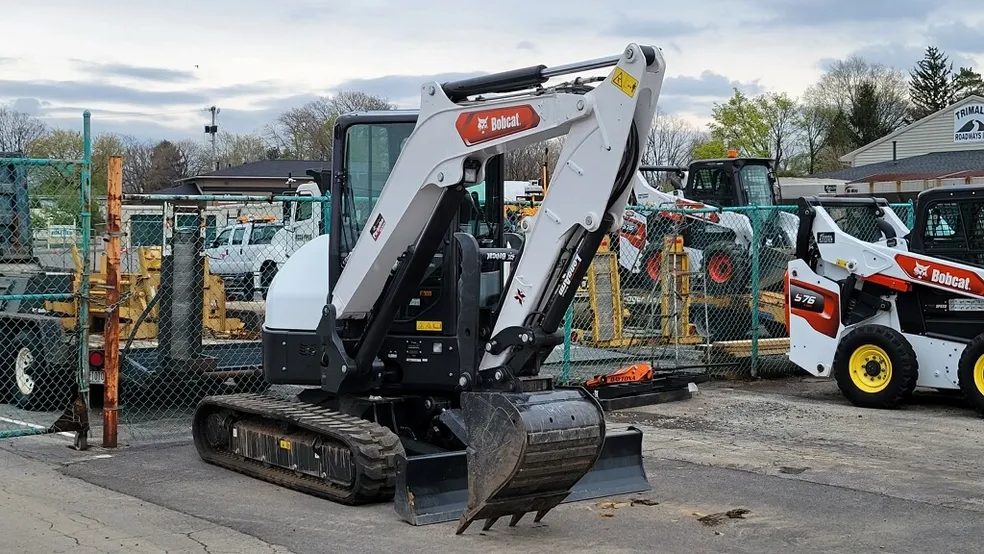 Bobcat mini excavator staged at the yard, available for rent in Rochester NY