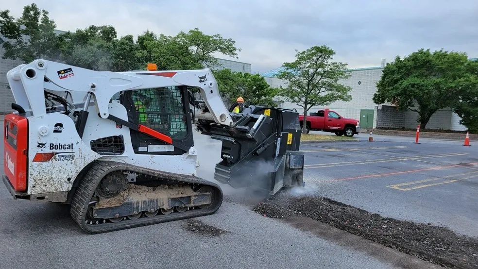Milling a parking lot with a cold planer — Piranha Rents, Rochester NY